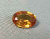 14.5 Carat Fancy Orange Sapphire Faceted Oval